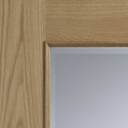 Oak Andrea With Clear Bevelled Glass And Raised Mouldings Unfinished Door