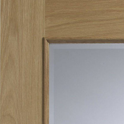 Oak Calabria With Clear Bevelled Glass And Raised Mouldings Unfinished Door